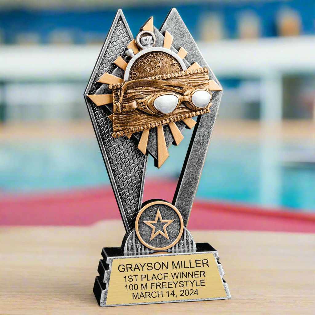 Swimming Sun Ray Award trophy in its individual box, demonstrating the protective packaging for gifting or presentations.