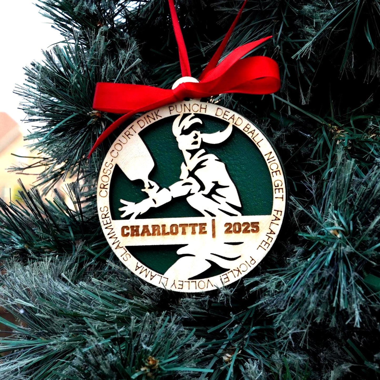 Decorative ornament with a red ribbon on a Christmas tree Pickleball Ornament