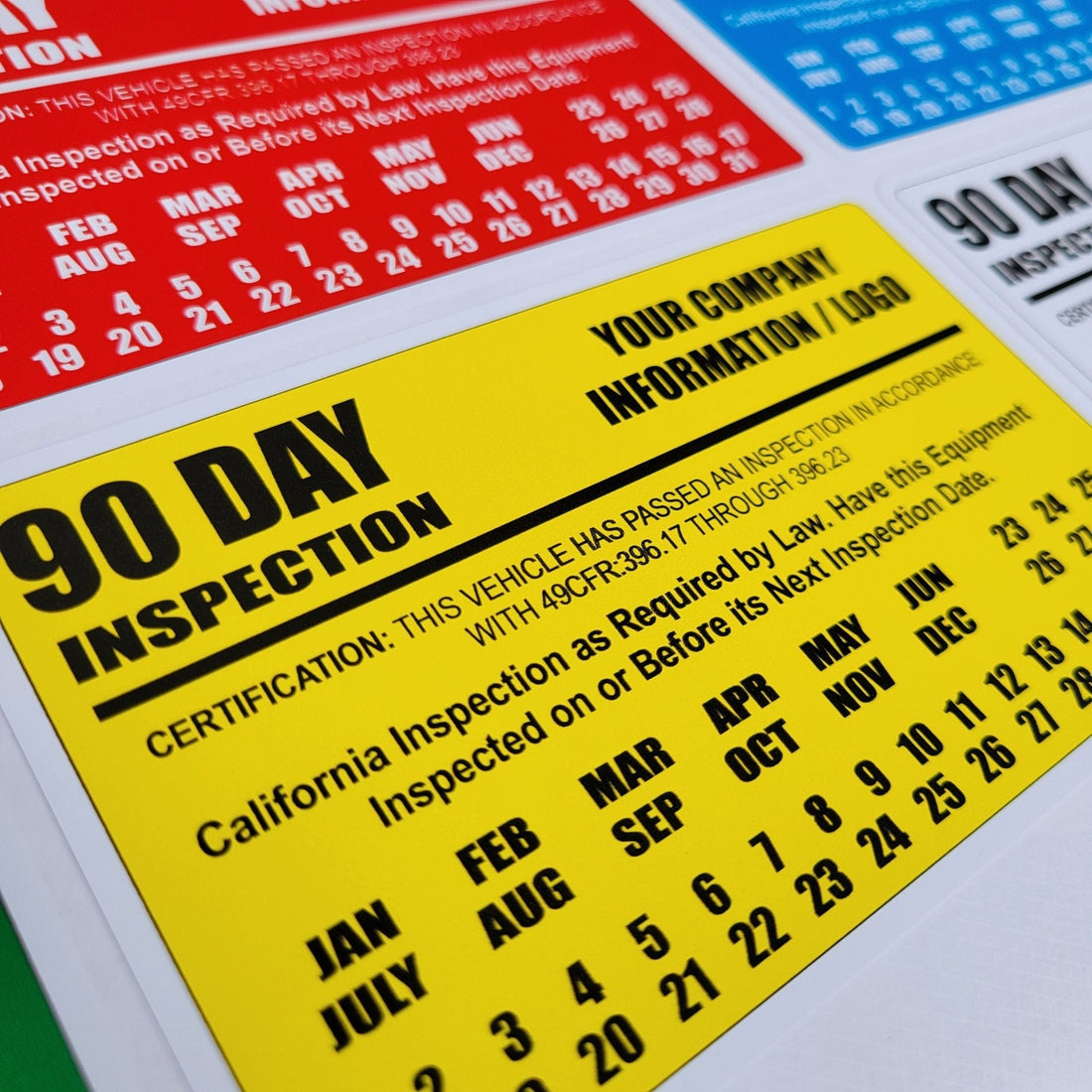 personalized California 90-day BIT inspection decal with company name and logo next to a federal annual DOT inspection sticker