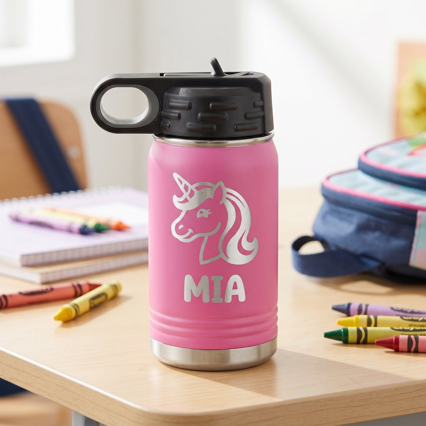 Pink personalized kids 12oz water bottle with engraved unicorn design and name