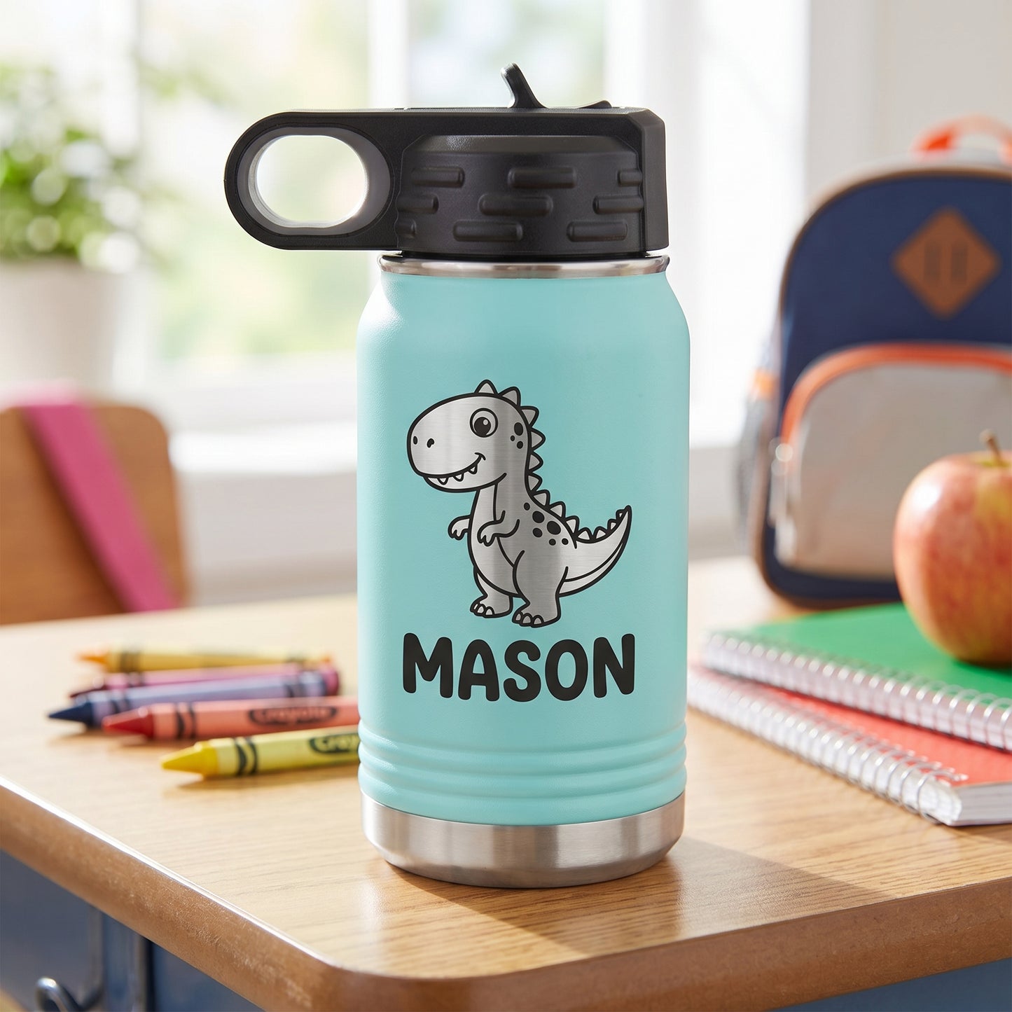 Teal personalized kids 12oz water bottle with engraved dinosaur design and name