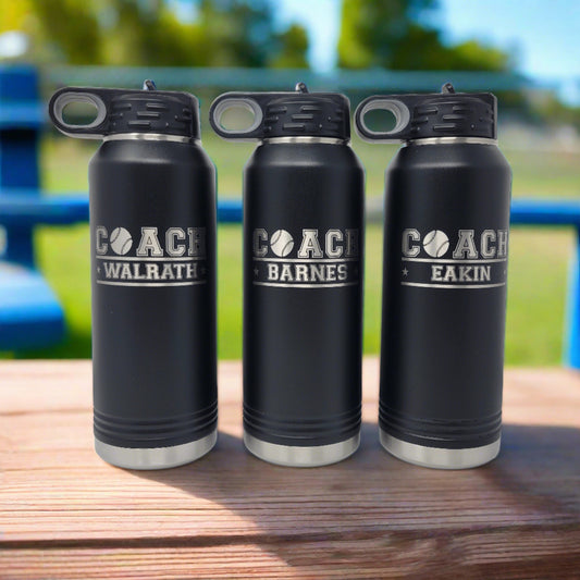 three personalized baseball coach water bottles, on a bench at the baseball field, sunny day, blue sky, professional photography