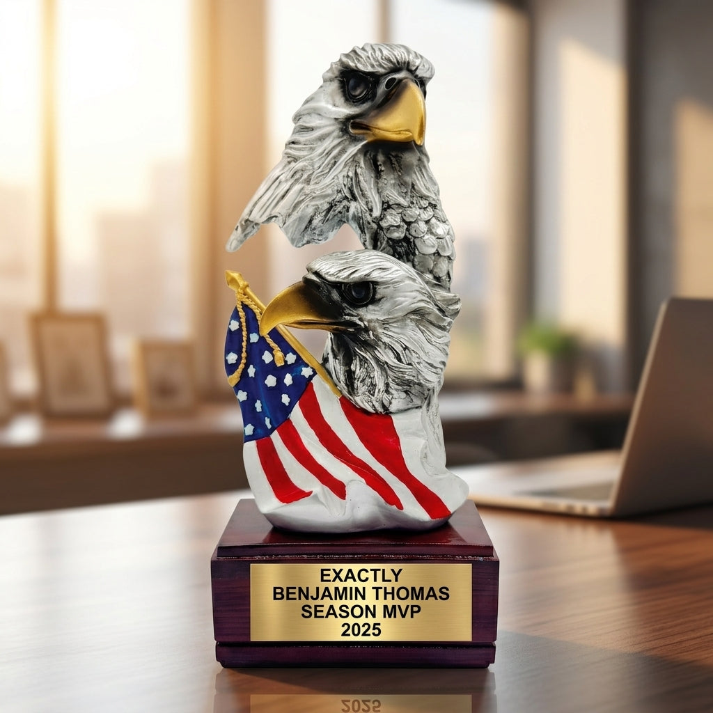 Close-up of laser-engraved gold nameplate on personalized trophy award showing custom name, achievement, and year