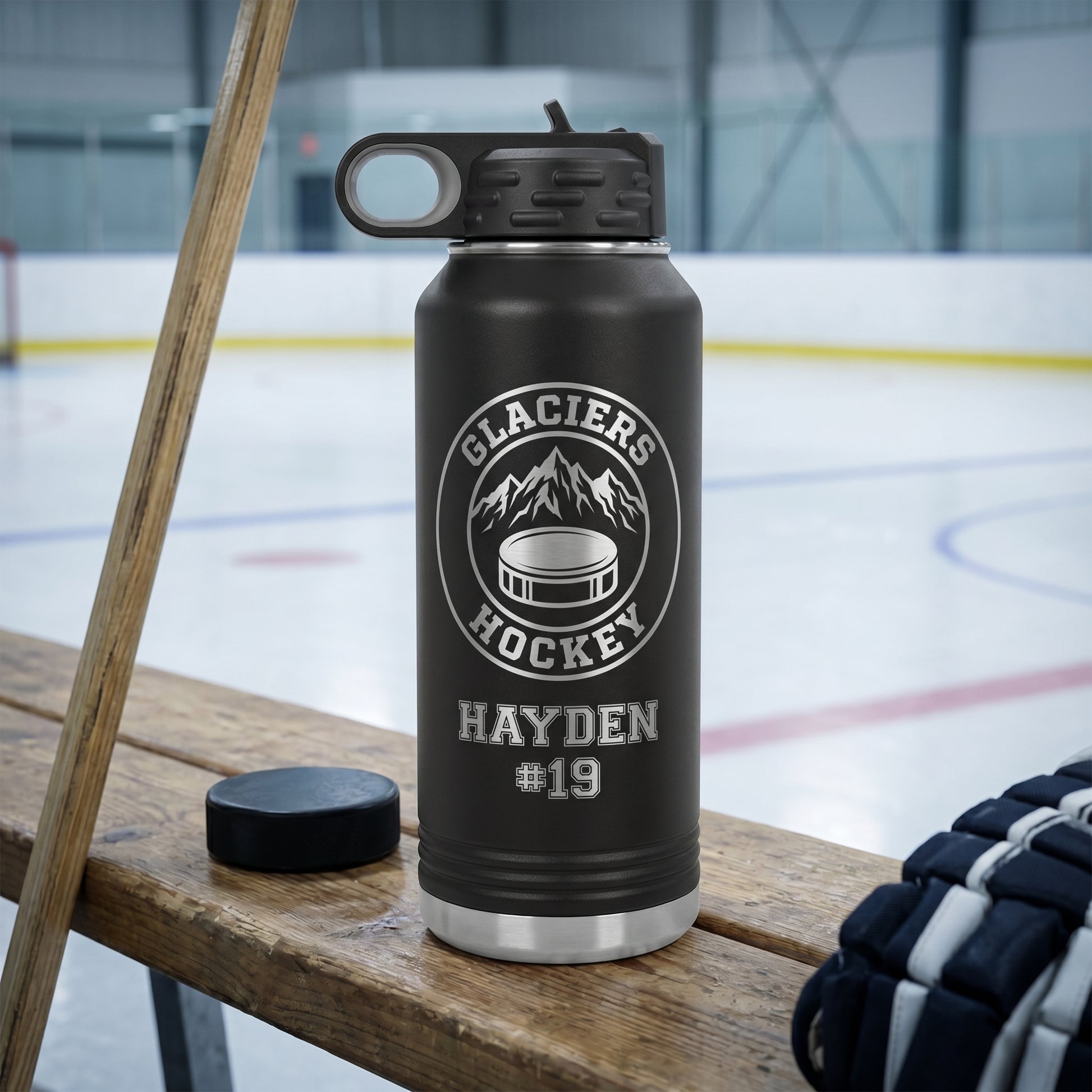 black 32oz engraved hockey water bottle with team crest and player name