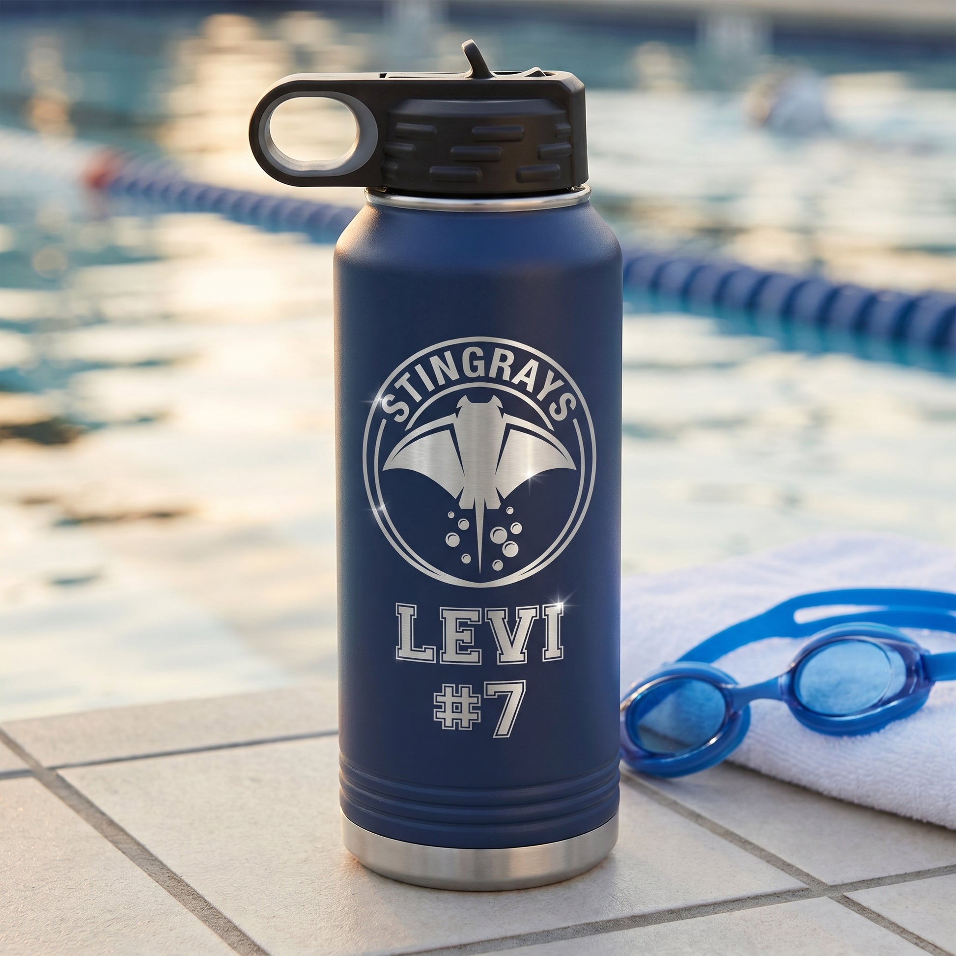 navy blue 32oz engraved swim team water bottle with team crest and swimmer name