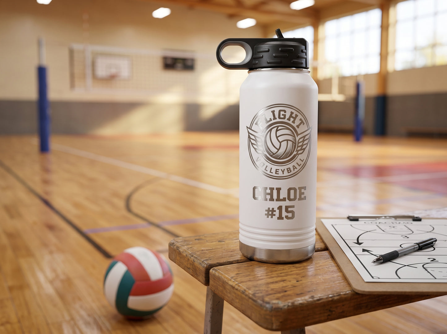 white engraved volleyball water bottle next to coaches clipboard with rotation diagram on sideline bench