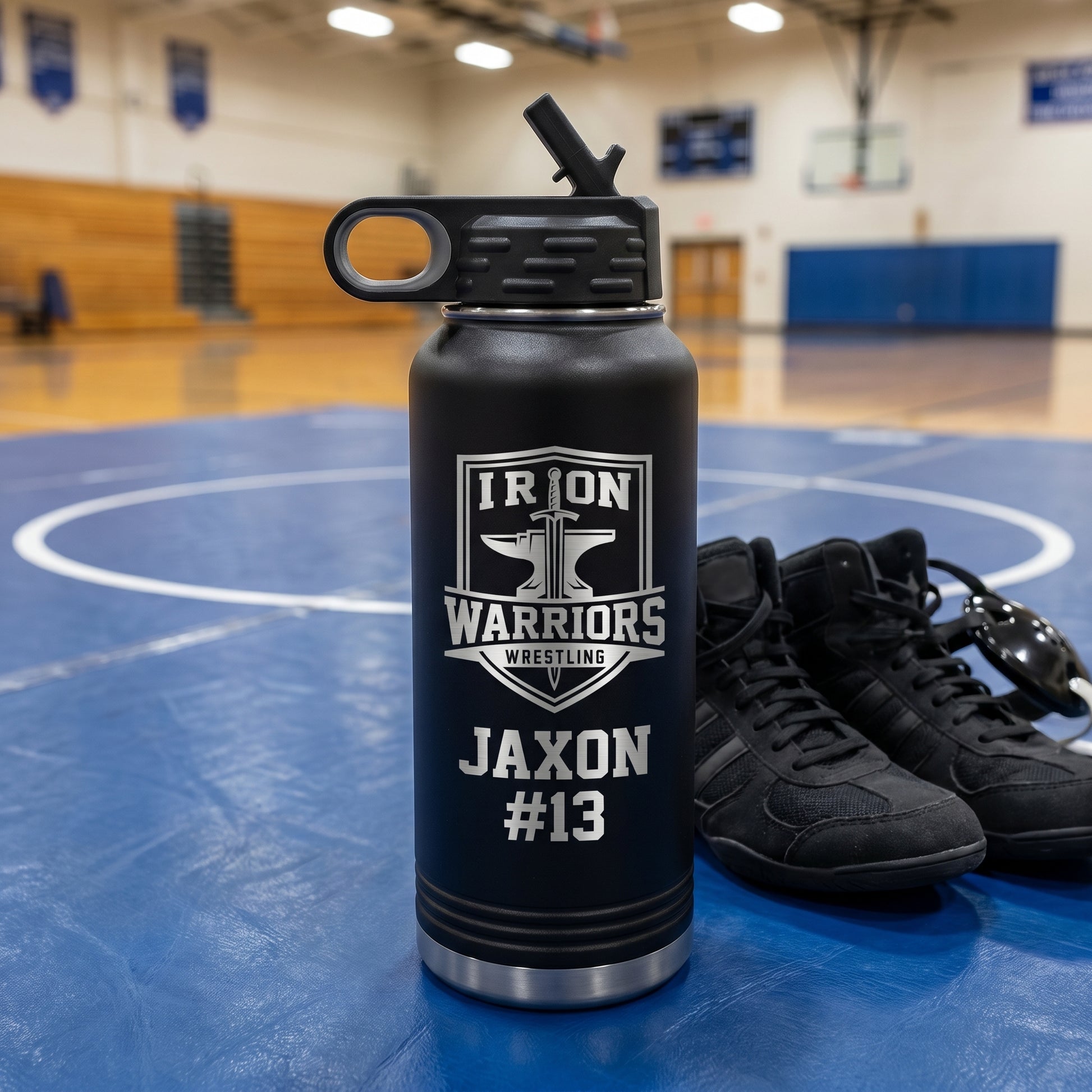 black 32oz engraved wrestling water bottle with iron warriors team crest and wrestler name