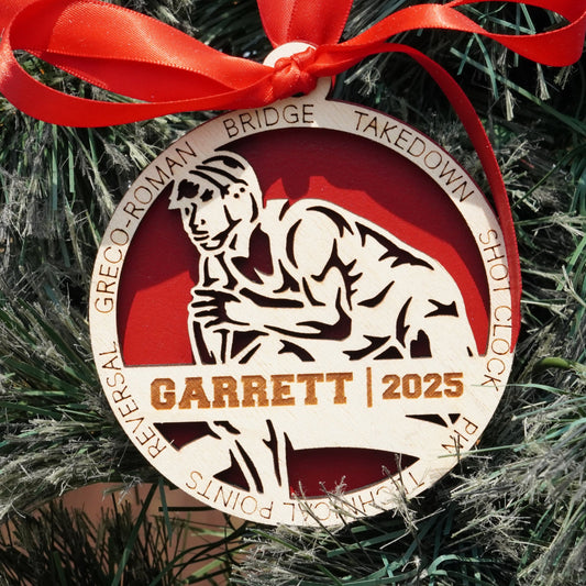 Decorative ornament with a red ribbon on a Christmas tree, featuring a wrestler, wrestling ornament, christmas gift for wrestler, wrestling ornament,