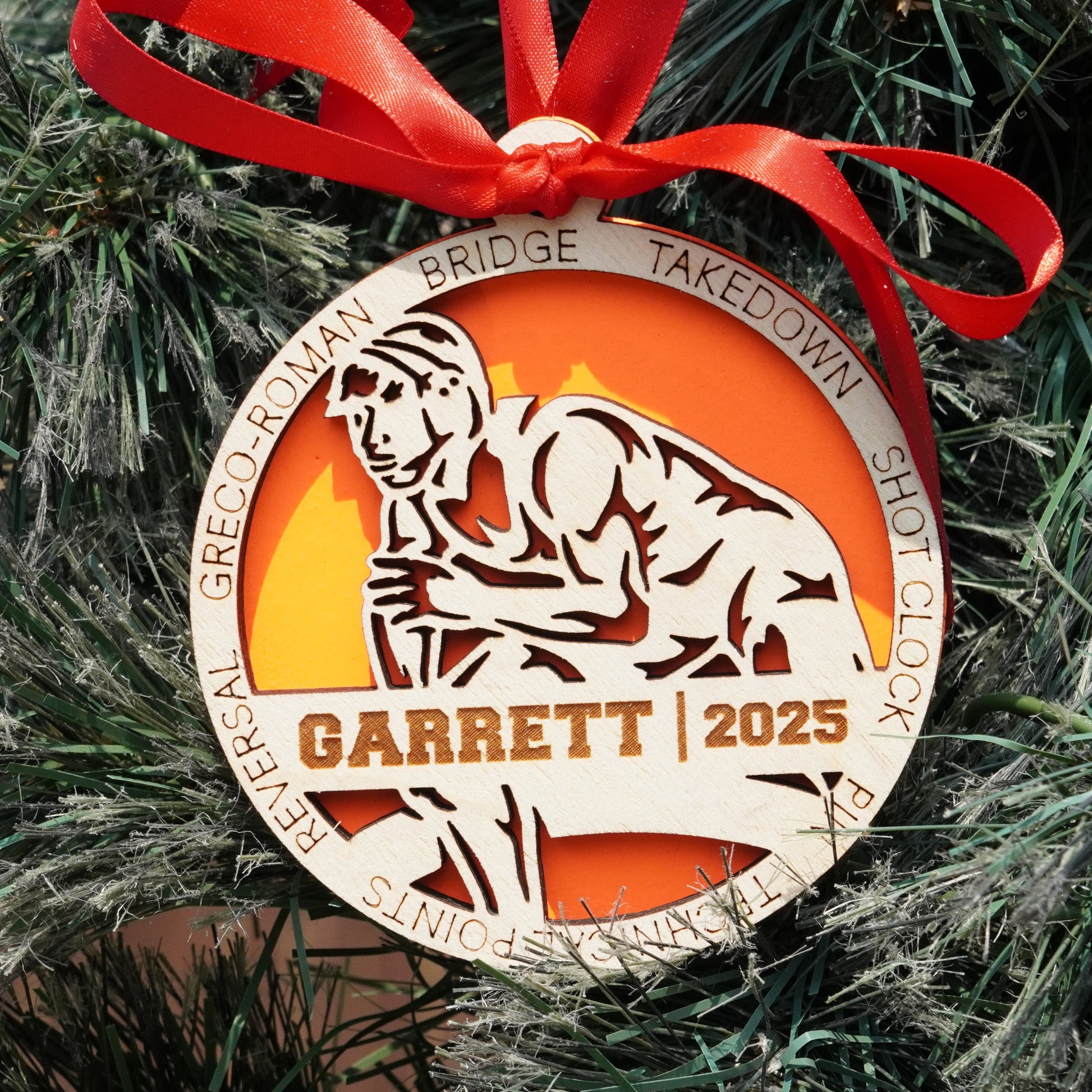 Decorative ornament with a tiger design on a Christmas tree Decorative ornament with a red ribbon on a Christmas tree, featuring a wrestler, wrestling ornament, christmas gift for wrestler, wrestling ornament,