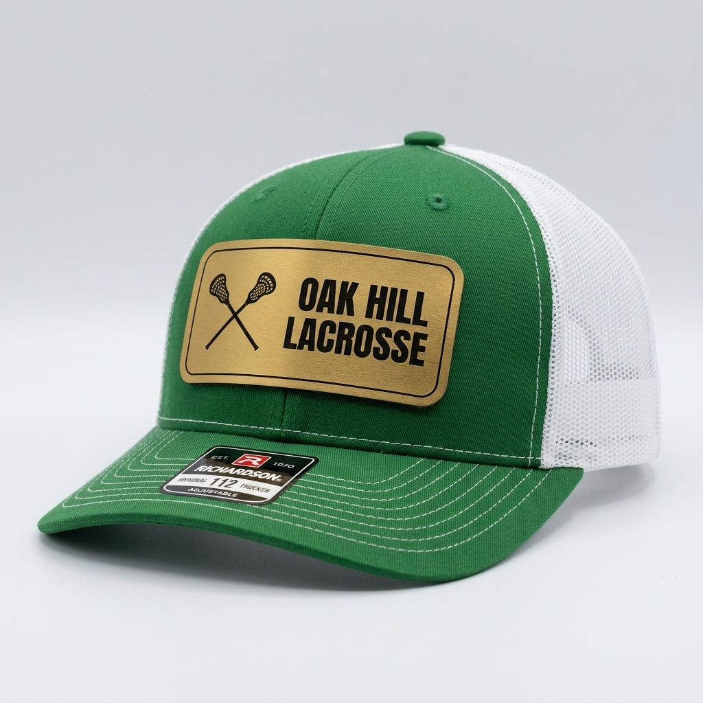 custom team hats with engraved lacrosse logo patch on kelly green trucker cap
