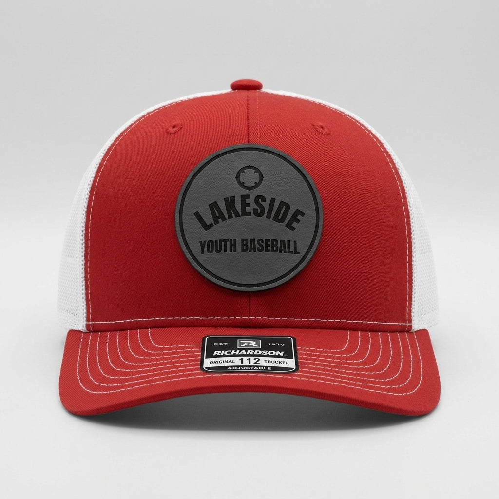 custom team hats with engraved youth baseball logo patch on red trucker cap
