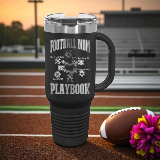 Football Mom Playbook 40oz Stanley Tumbler with Handle — laser-etched stainless steel travel mug made for Friday Night Lights, tailgates, and long tournament days. The Football Mom “Playbook” design is permanently engraved (not printed) so it won’t peel, crack, or fade. Perfect team mom gift, booster club gift, senior night gift, and everyday car cup for busy sports moms.