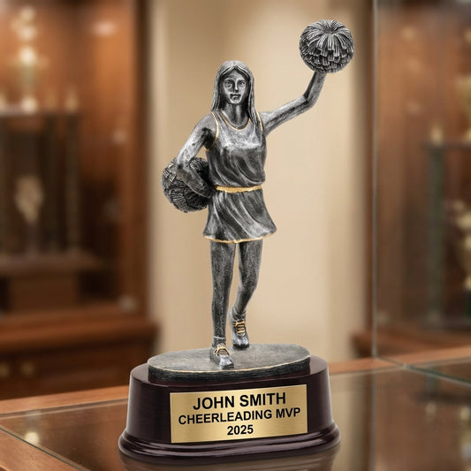 Personalized 10-inch cheerleading trophy with custom laser-engraved gold nameplate on weighted base for awards and recognition