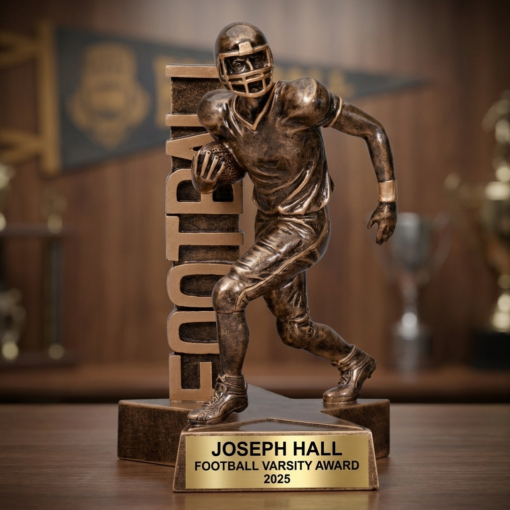 Close-up of the custom engraved name plate on a personalized Football award (resin) — featuring Personalized high school football championship award, a popular choice for College football programs for High school sports awards nights