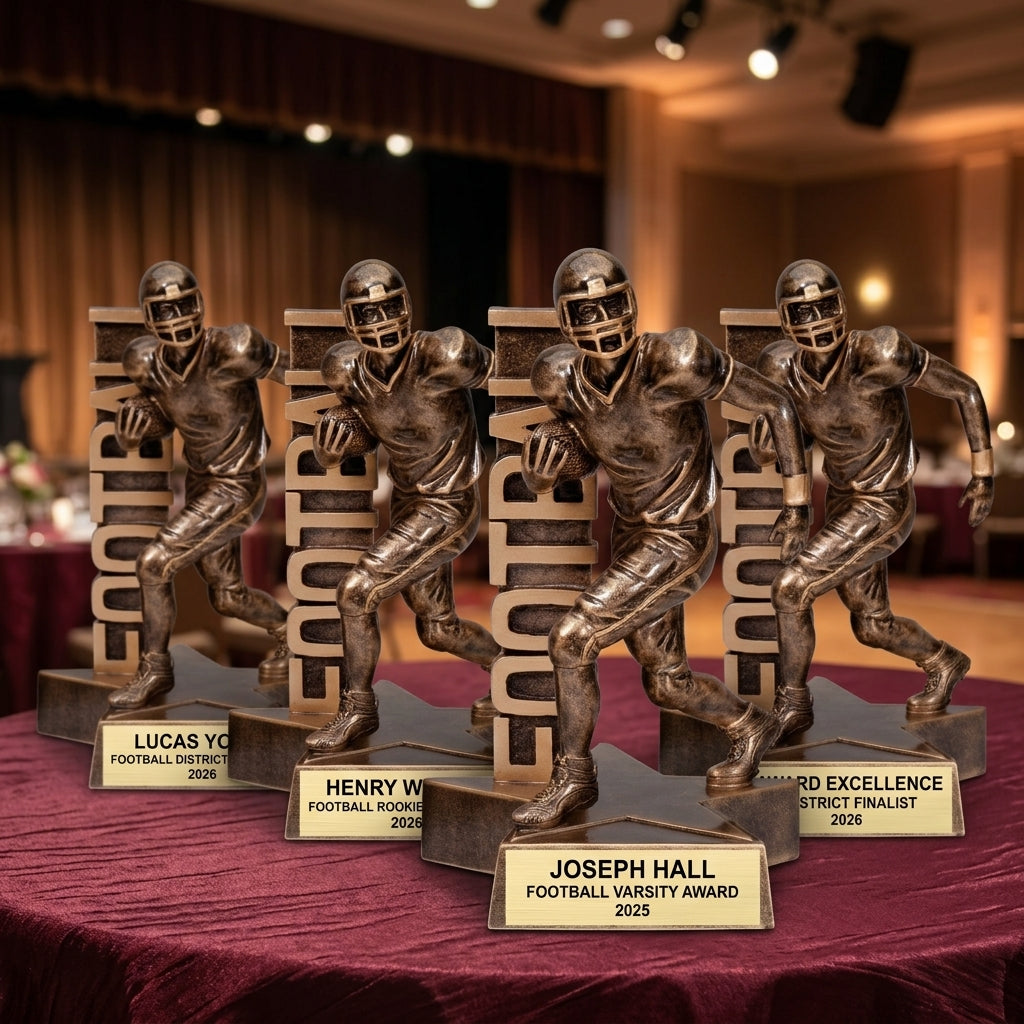 Multiple personalized Football awards displayed together for a banquet or team order, each custom engraved in resin — featuring Football team recognition award with custom plate, a popular choice for Team managers for Team recognition events
