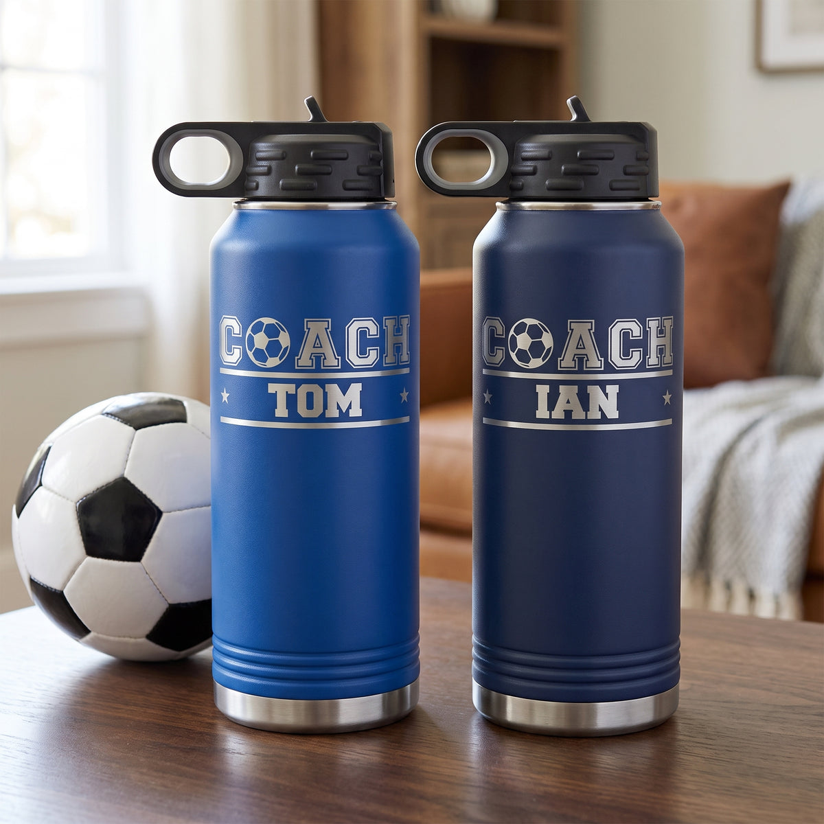 Royal blue and navy soccer coach gift bottles with a soccer ball, custom engraved with the coach names for a team gift