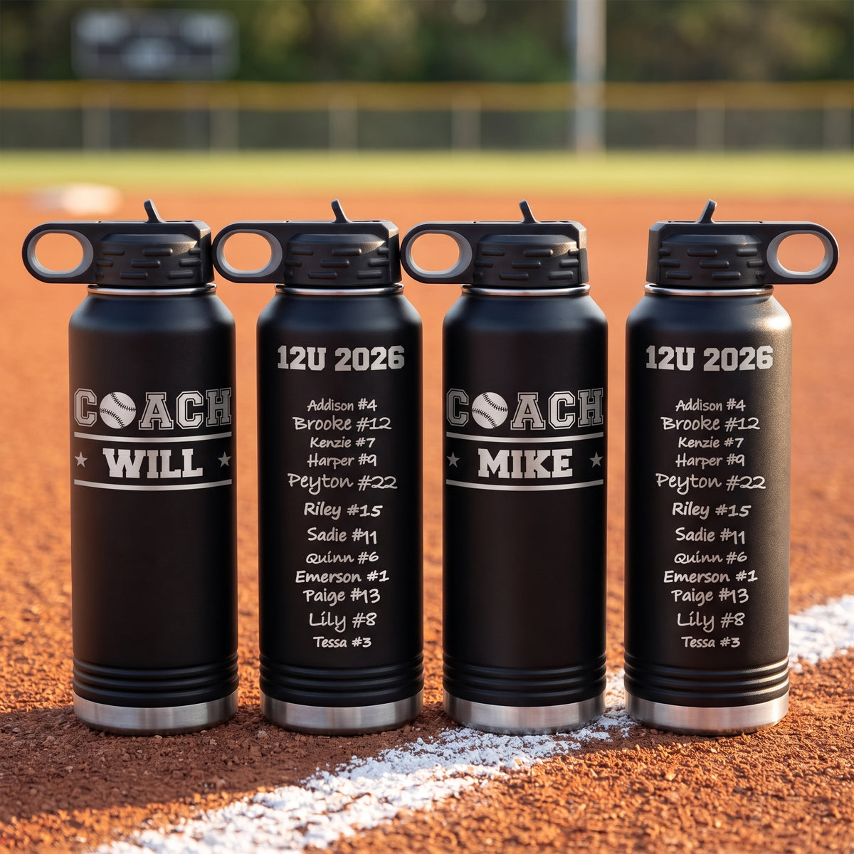 Engraved softball coach water bottles lined up on the diamond with the player signatures and coach names ready for the banquet