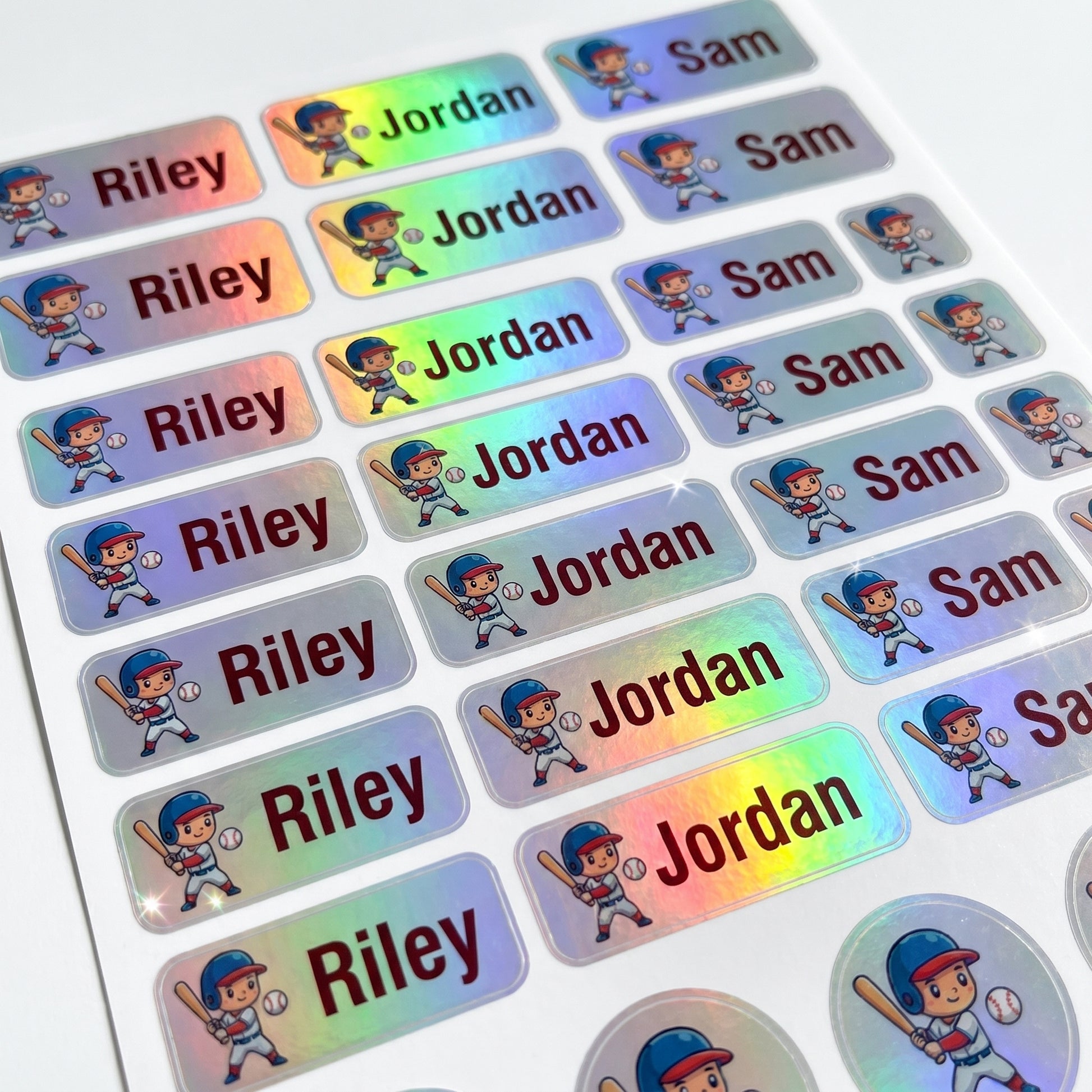 Holographic all-star sports name label sticker sheet close-up with rainbow shimmer