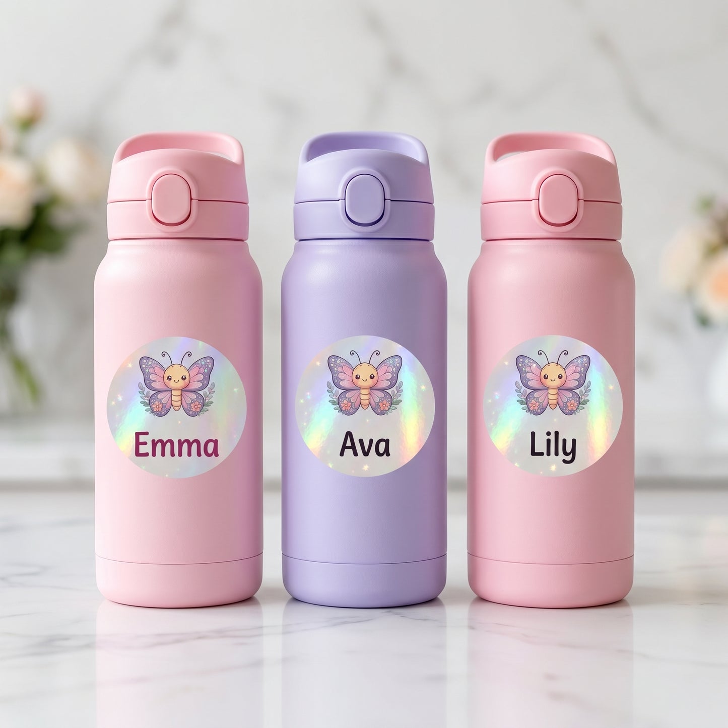 Personalized butterfly & floral name labels on three kids water bottles
