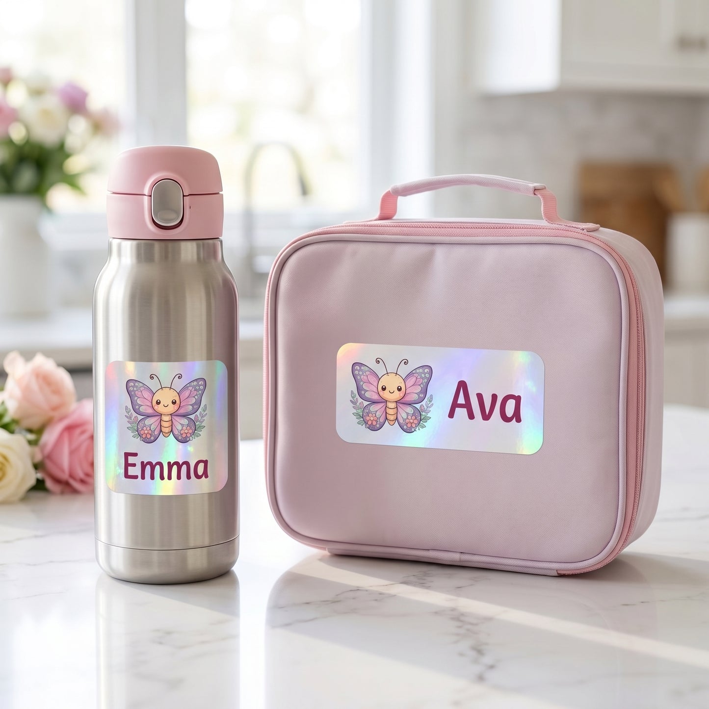 Personalized butterfly & floral name labels on a kids water bottle and lunchbox
