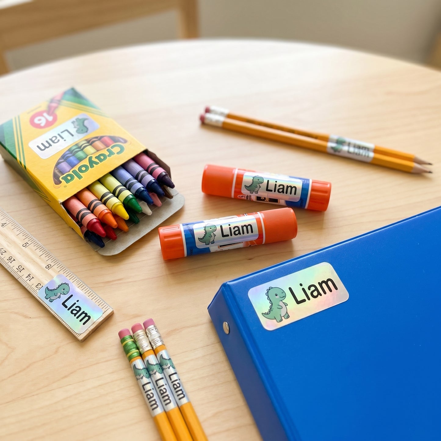 dinosaur name labels on school supplies - crayons, glue, ruler, pencils, binder