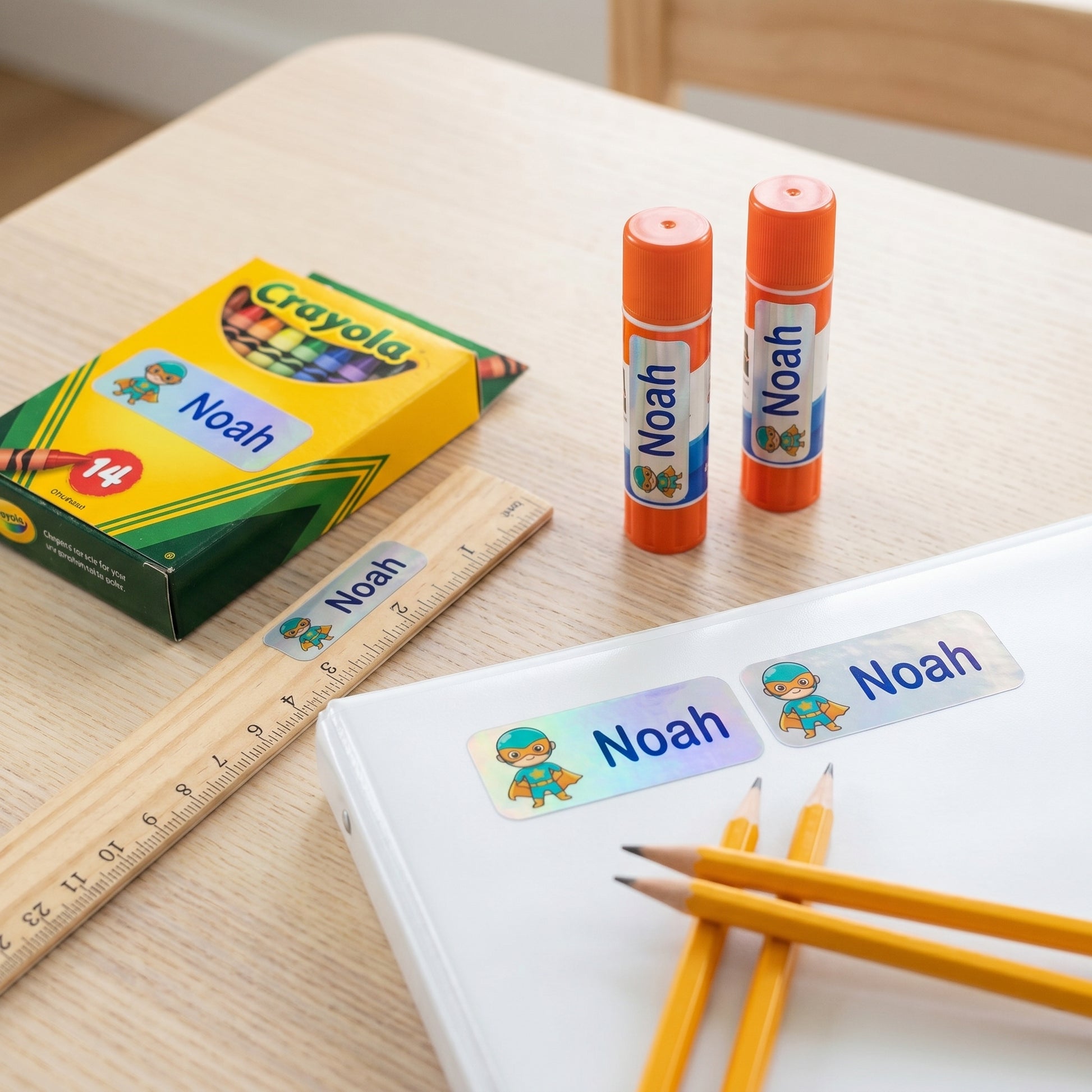 caped hero name labels on school supplies - crayons, glue, ruler, pencils, binder