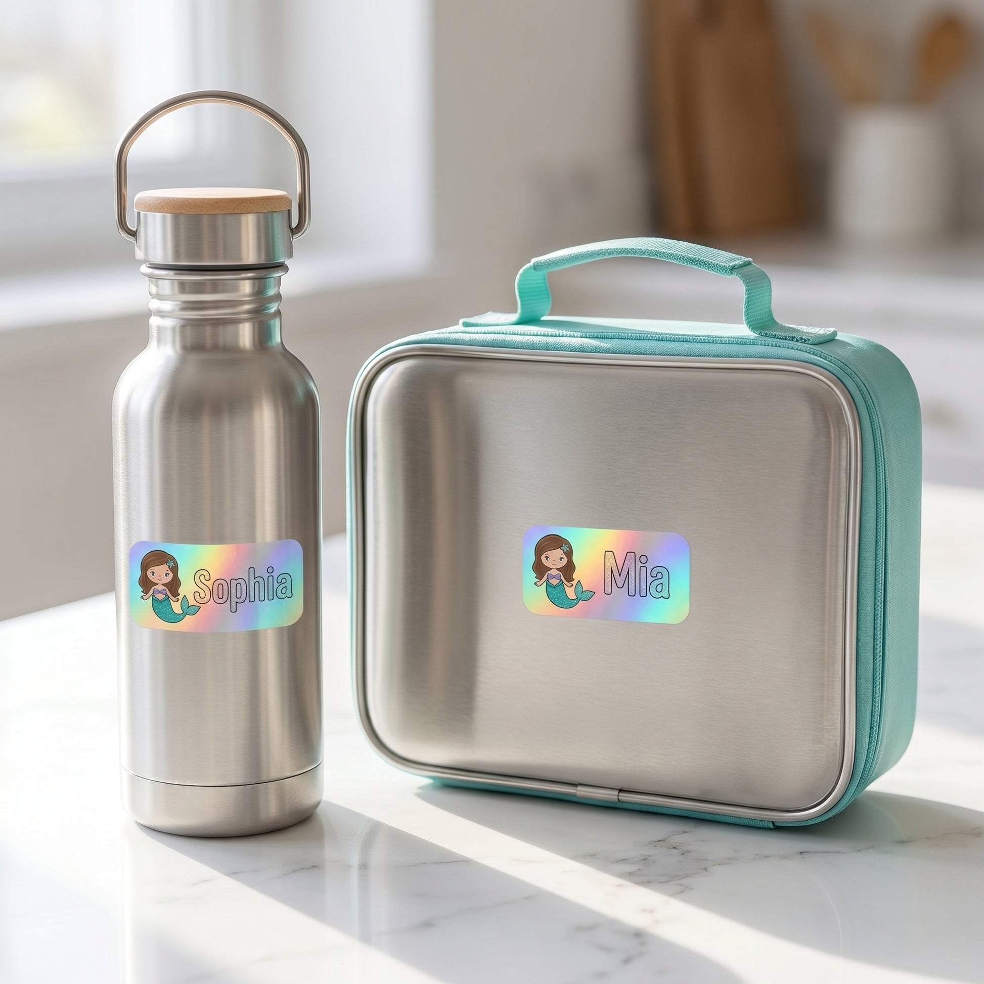 Personalized mermaid name labels on a kids water bottle and lunchbox