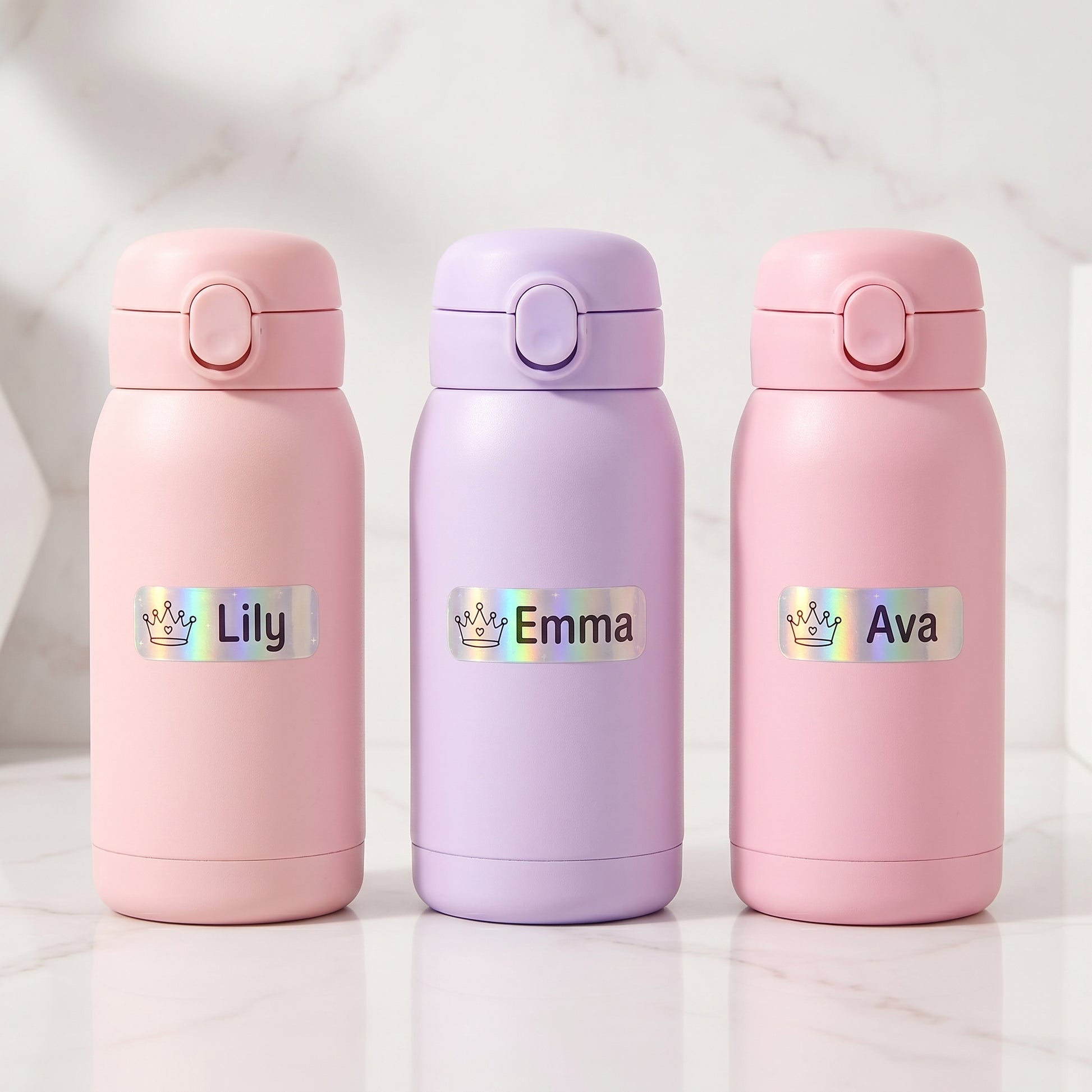 Personalized princess & castle name labels on three kids water bottles