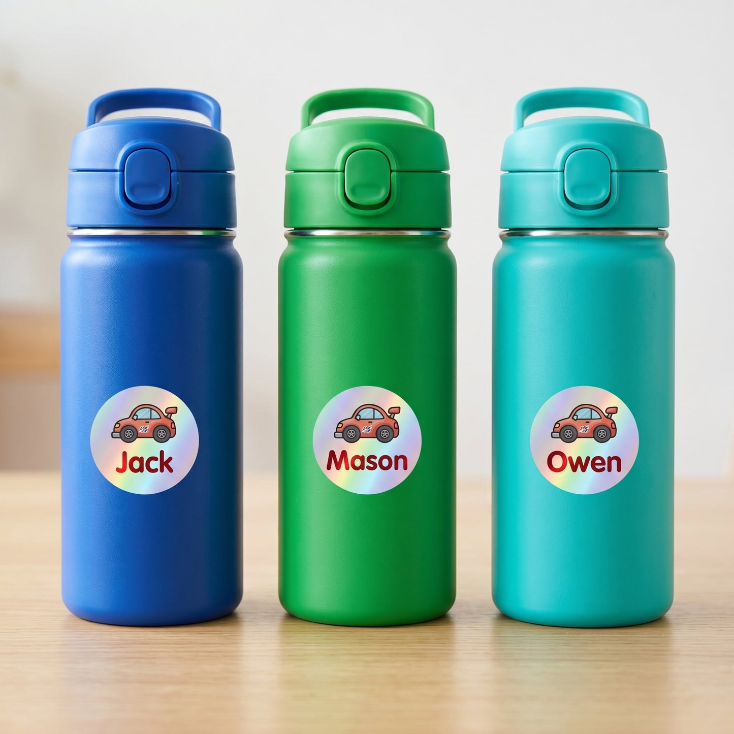 Personalized race cars name labels on three kids water bottles