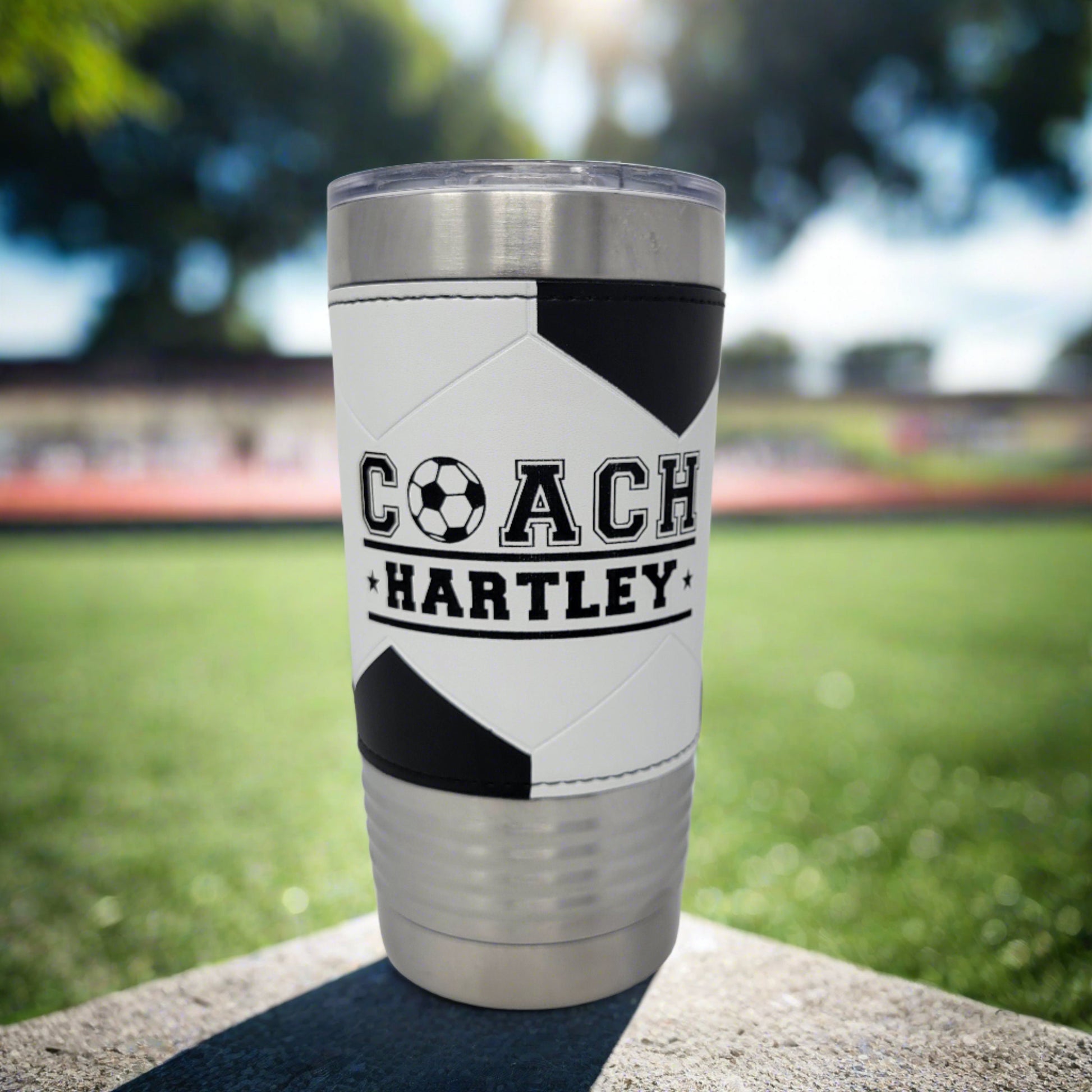 Soccer coach tumbler lid detail – spill-resistant slider lid