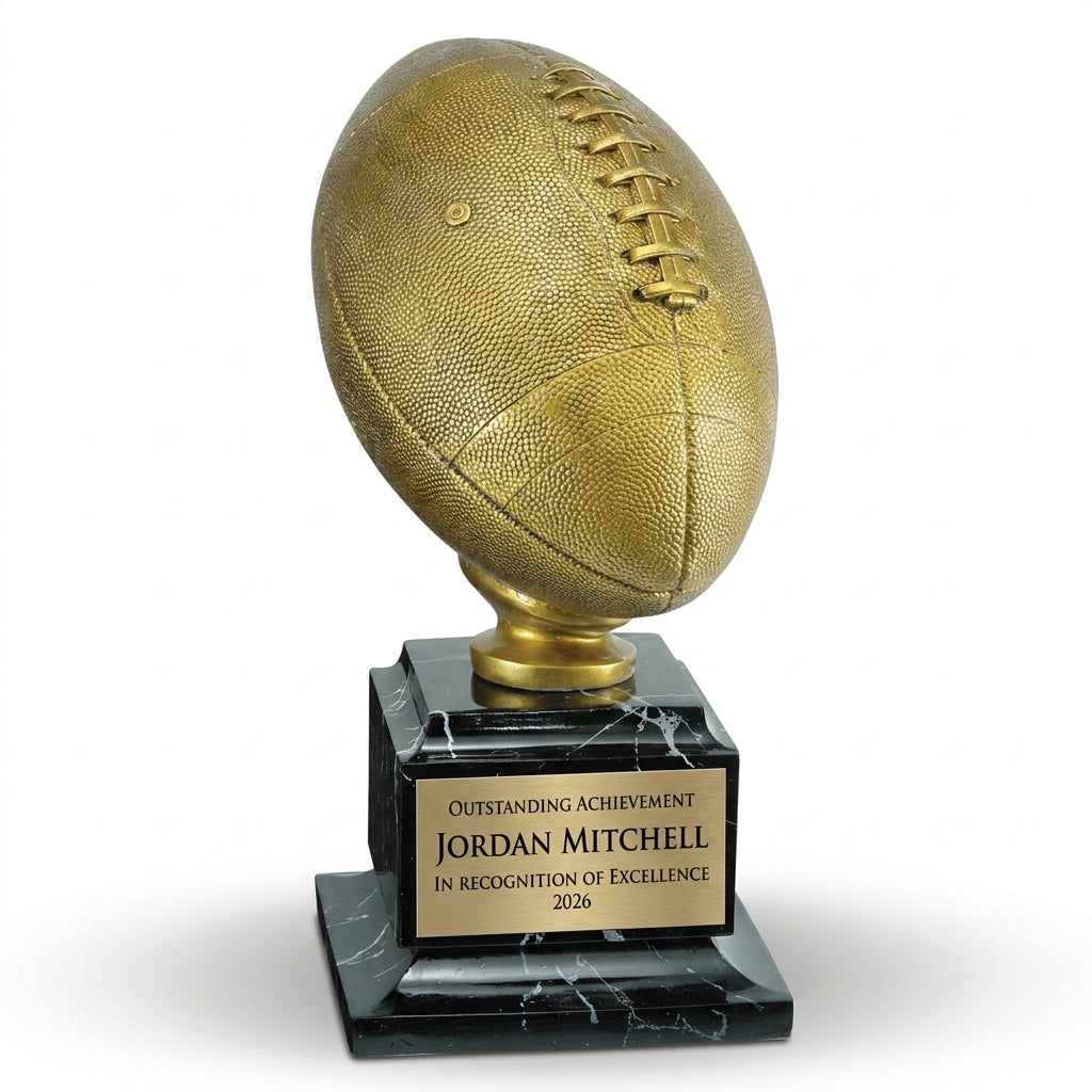 Personalized Antique Gold Football Resin Trophy resin award, custom laser engraved recognition award on a clean white studio background
