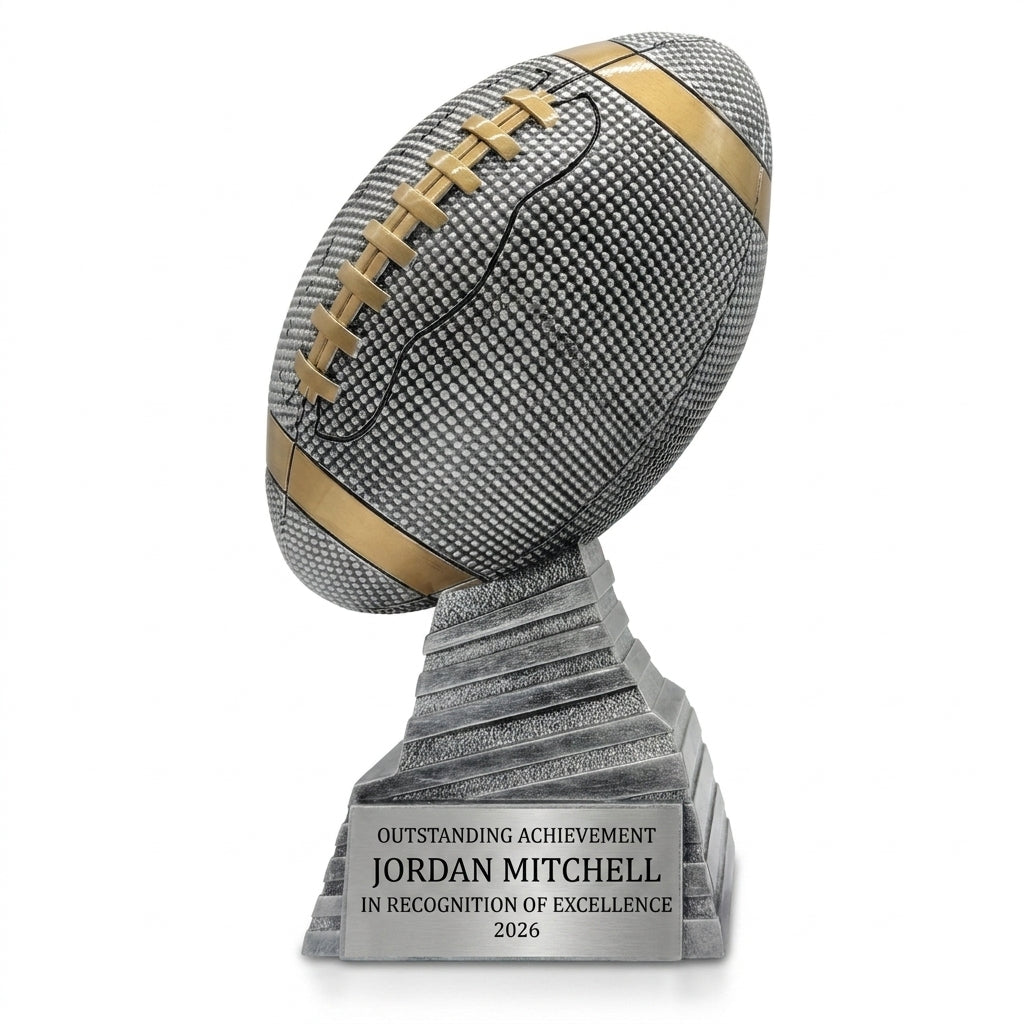 Personalized Antique Silver Football Stand Trophy resin award, custom laser engraved recognition award on a clean white studio background