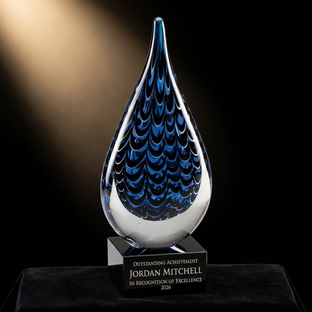Personalized Art Glass art glass award on black velvet under awards-ceremony spotlight, engraved champion and lifetime achievement award