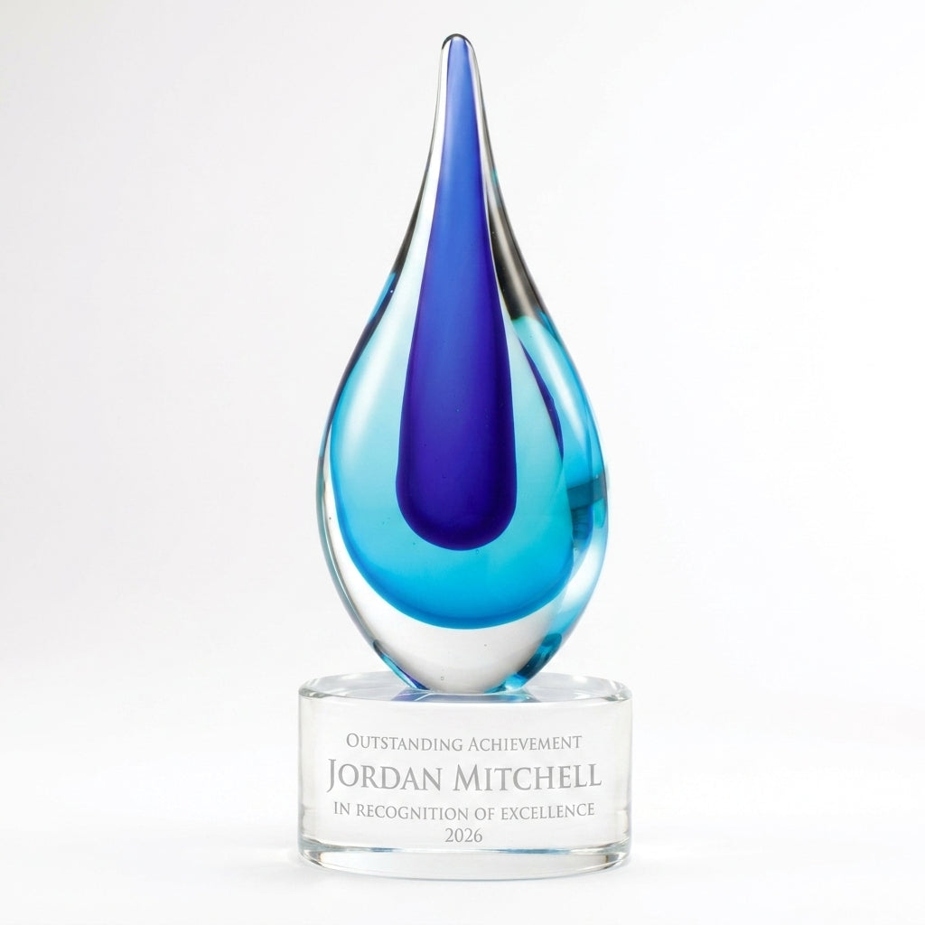 Personalized Blue art glass award, custom laser engraved recognition award on a clean white studio background