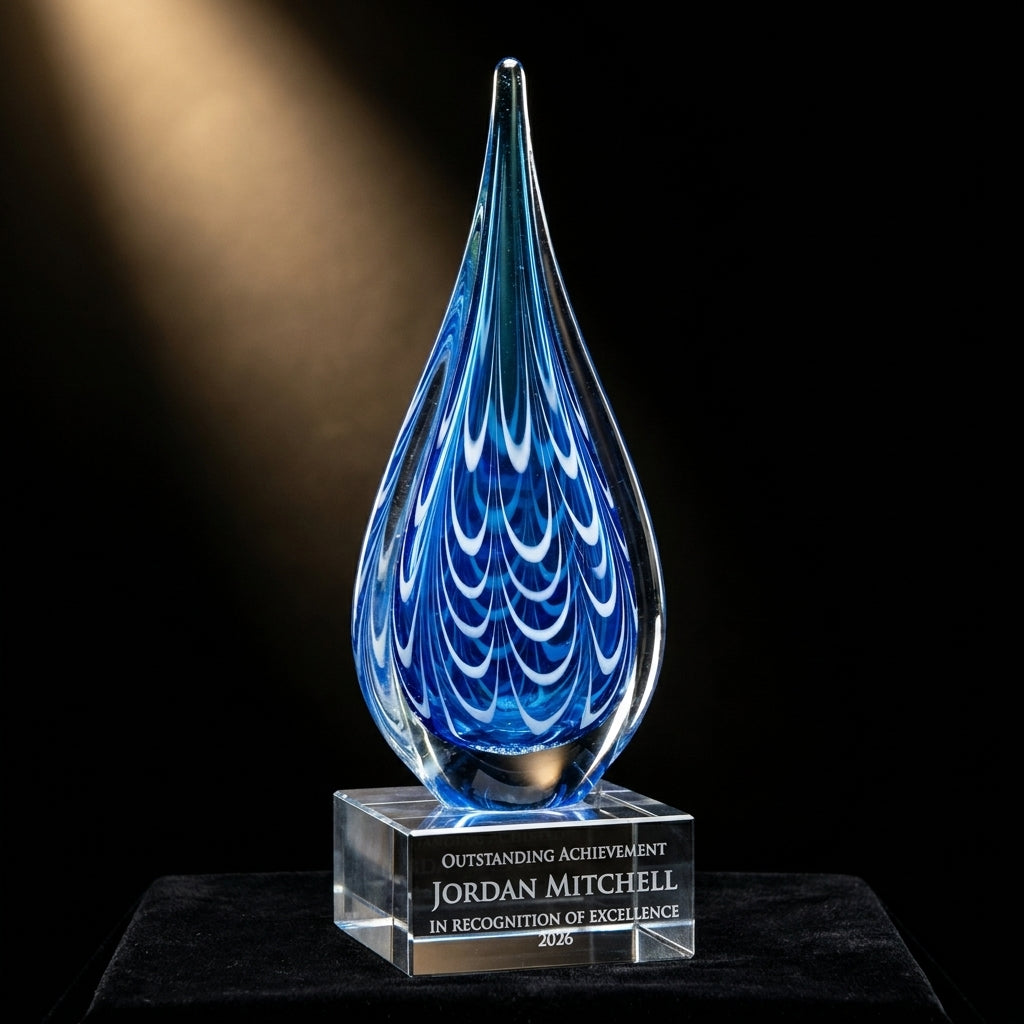 Personalized Art Glass art glass award on black velvet under awards-ceremony spotlight, engraved champion and lifetime achievement award
