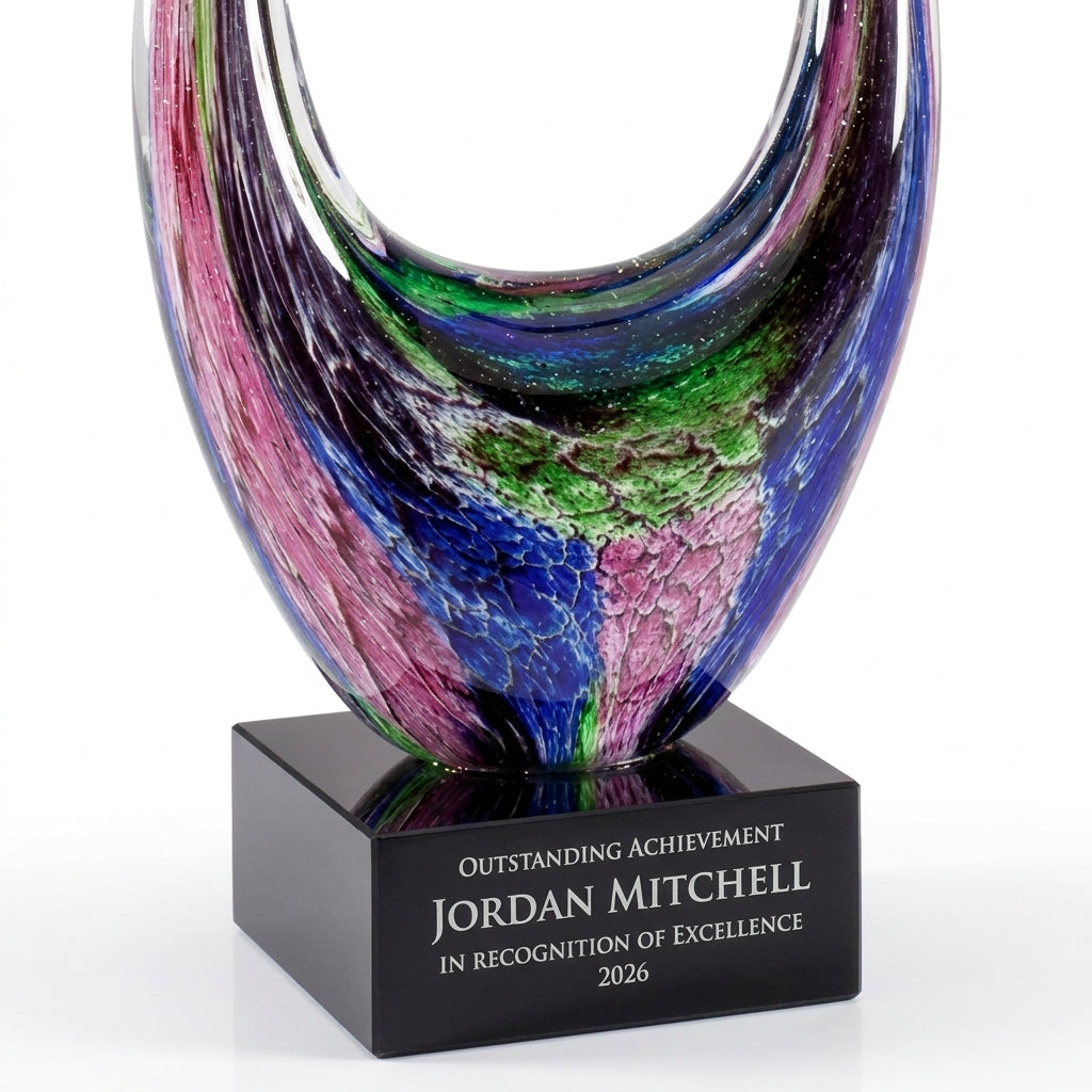 Personalized Art Glass art glass award, custom laser engraved recognition award on a clean white studio background
