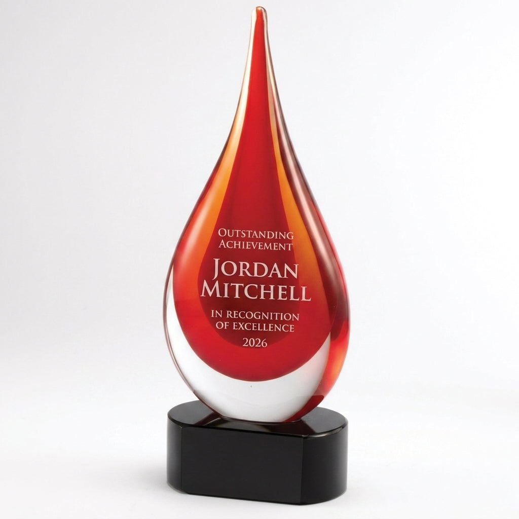 Personalized Red art glass award, custom laser engraved recognition award on a clean white studio background