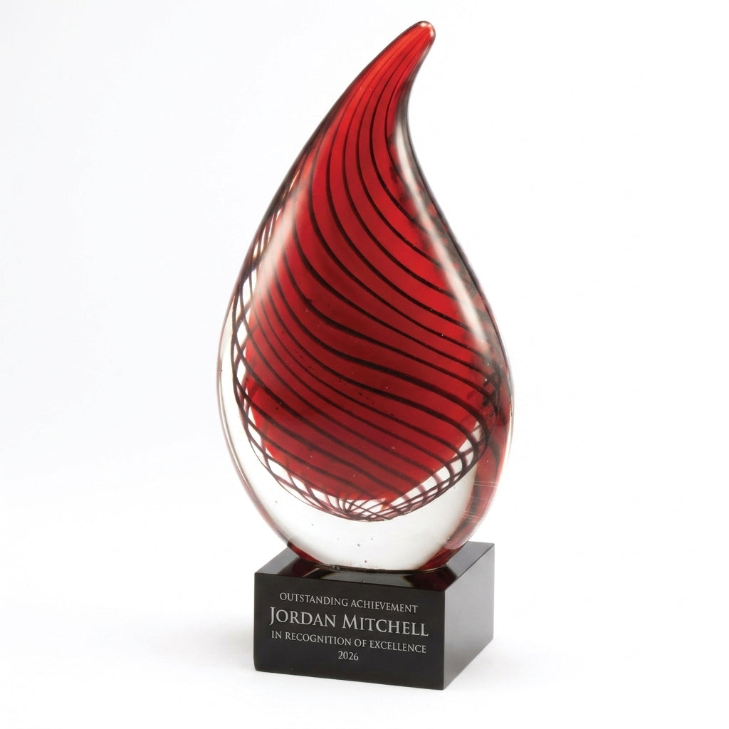 Personalized Red art glass award, custom laser engraved recognition award on a clean white studio background
