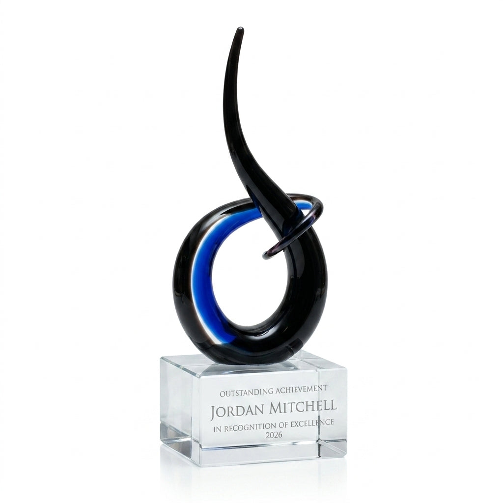 Personalized Black Blue Flame Knot art glass award, custom laser engraved recognition award on a clean white studio background