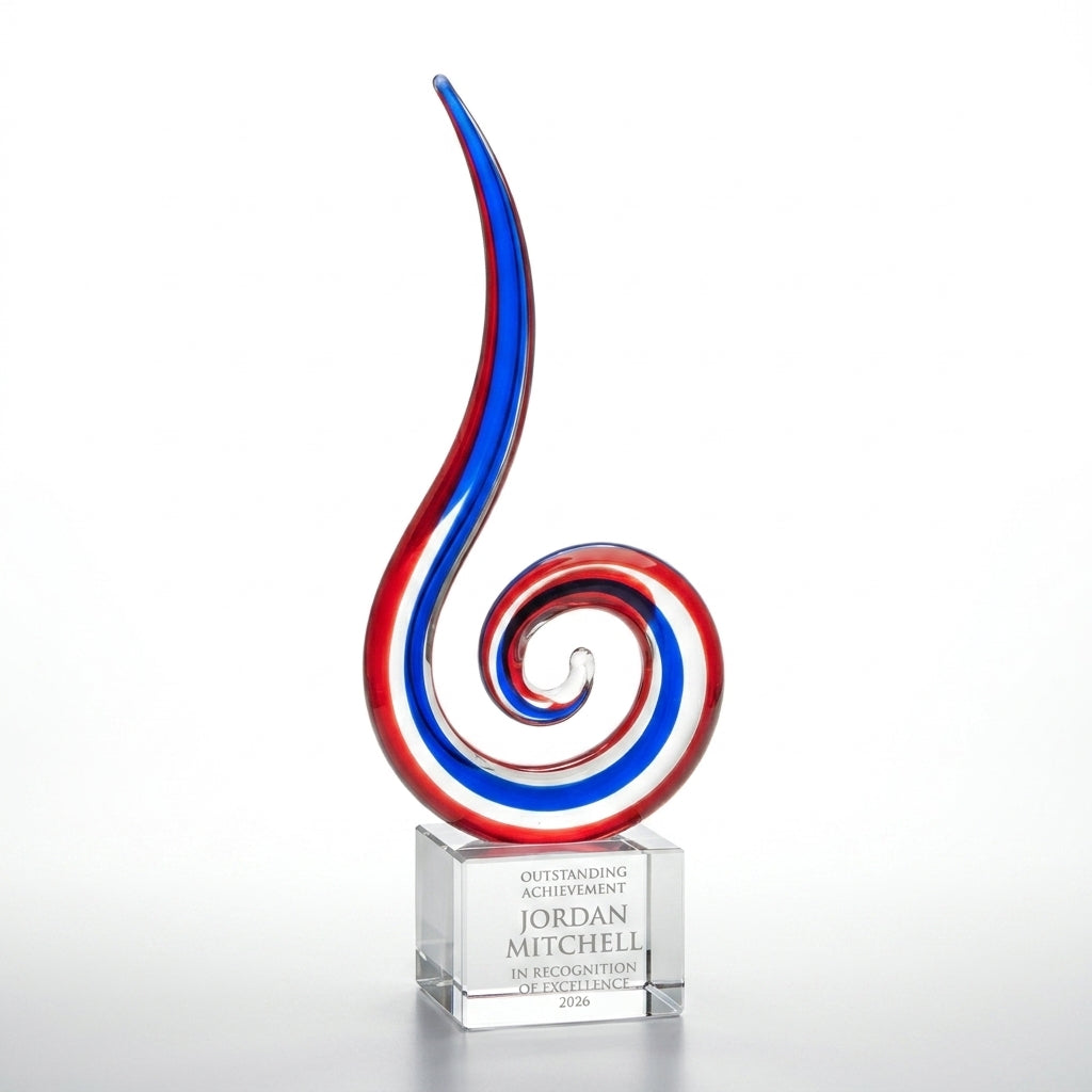 Personalized Red White Blue Spiral art glass award, custom laser engraved recognition award on a clean white studio background
