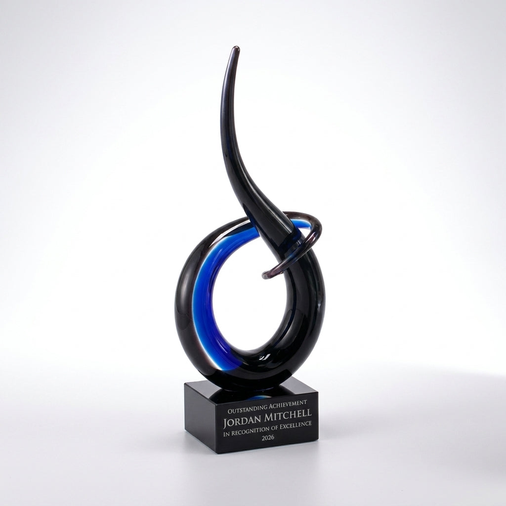 Personalized Sculpture art glass award, custom laser engraved recognition award on a clean white studio background