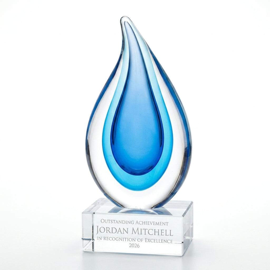 Personalized Sculpture art glass award, custom laser engraved recognition award on a clean white studio background