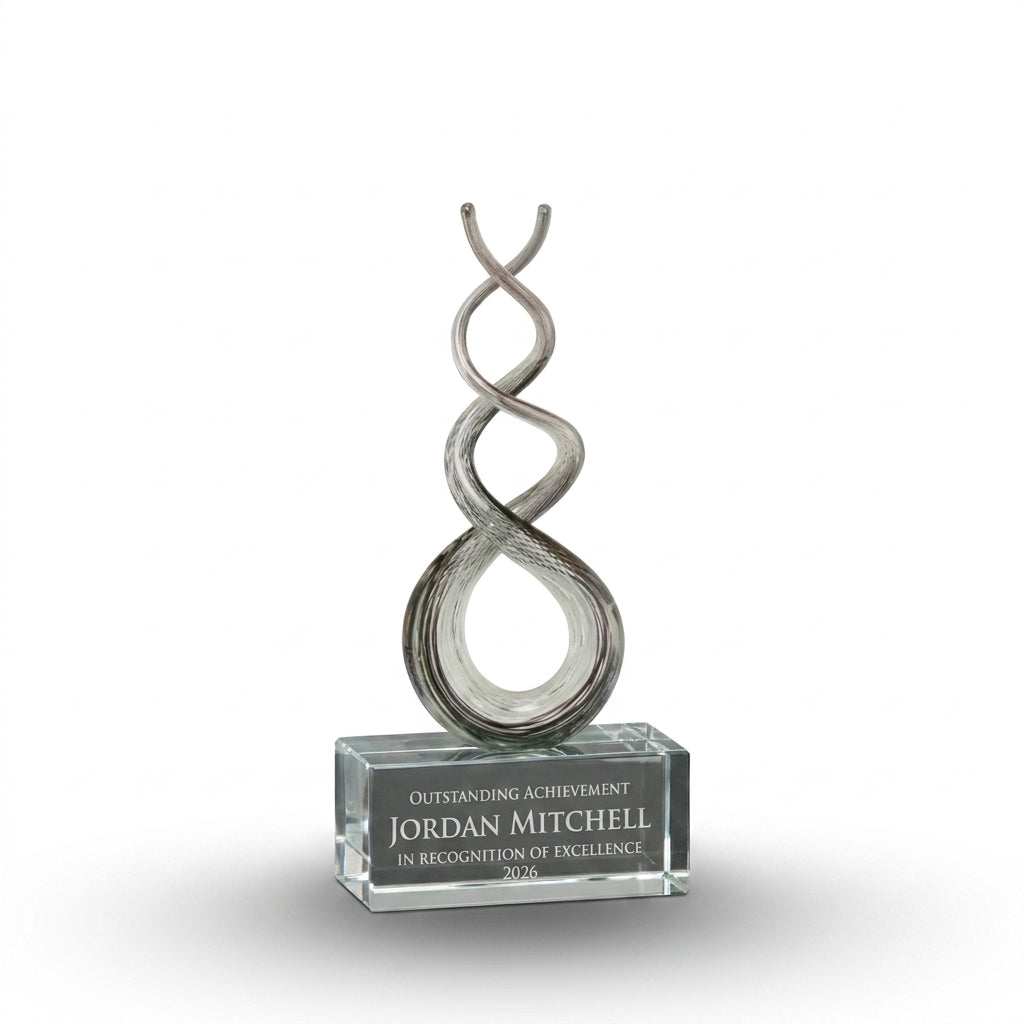 Personalized Smoke Crystal Twist art glass award, custom laser engraved recognition award on a clean white studio background