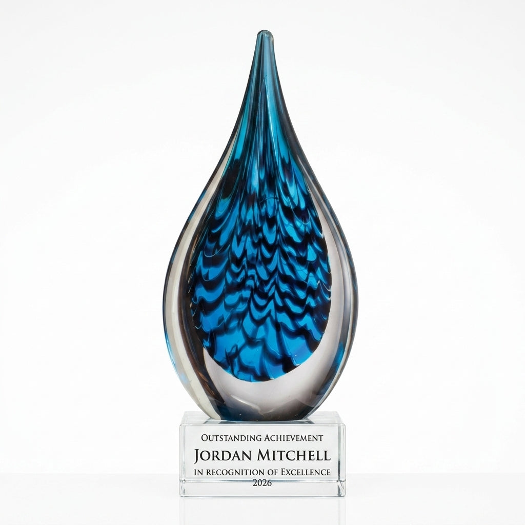 Personalized Sculpture art glass award, custom laser engraved recognition award on a clean white studio background