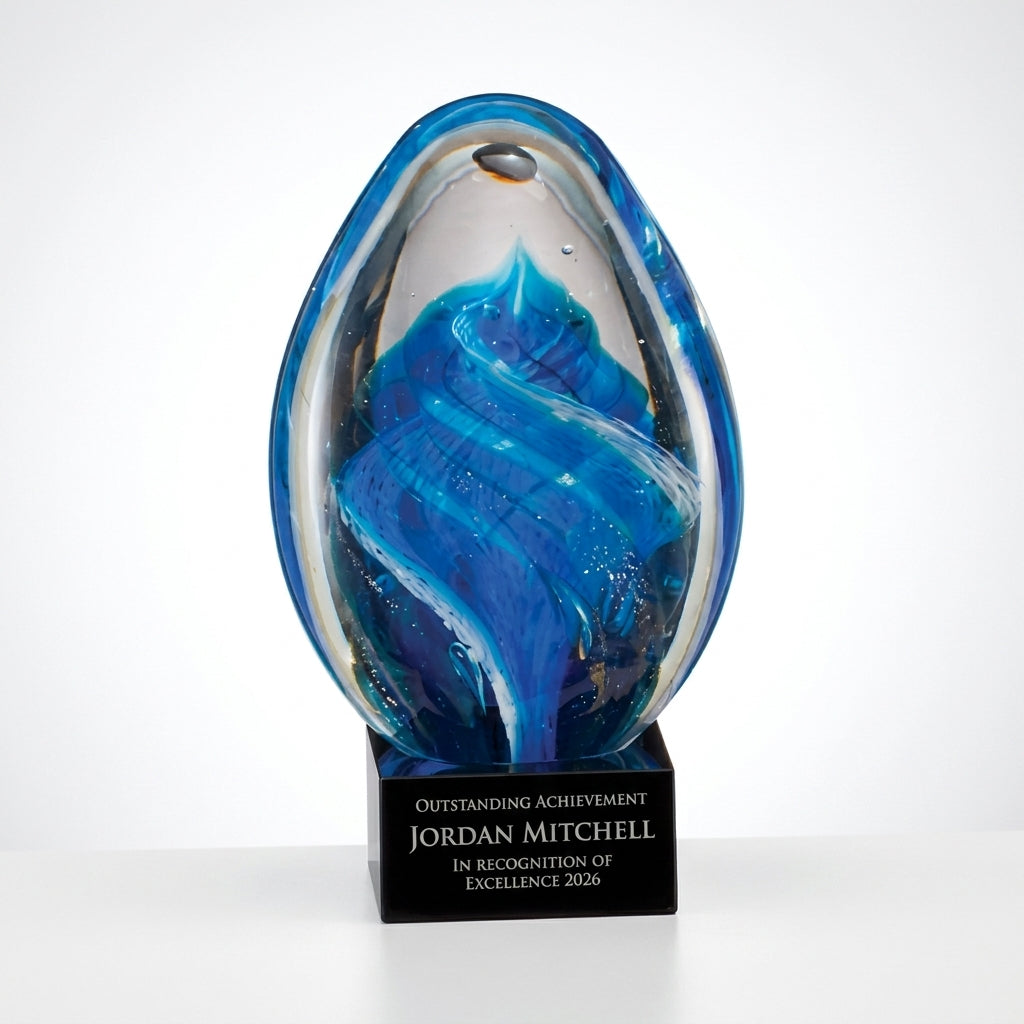 Personalized Sculpture art glass award, custom laser engraved recognition award on a clean white studio background
