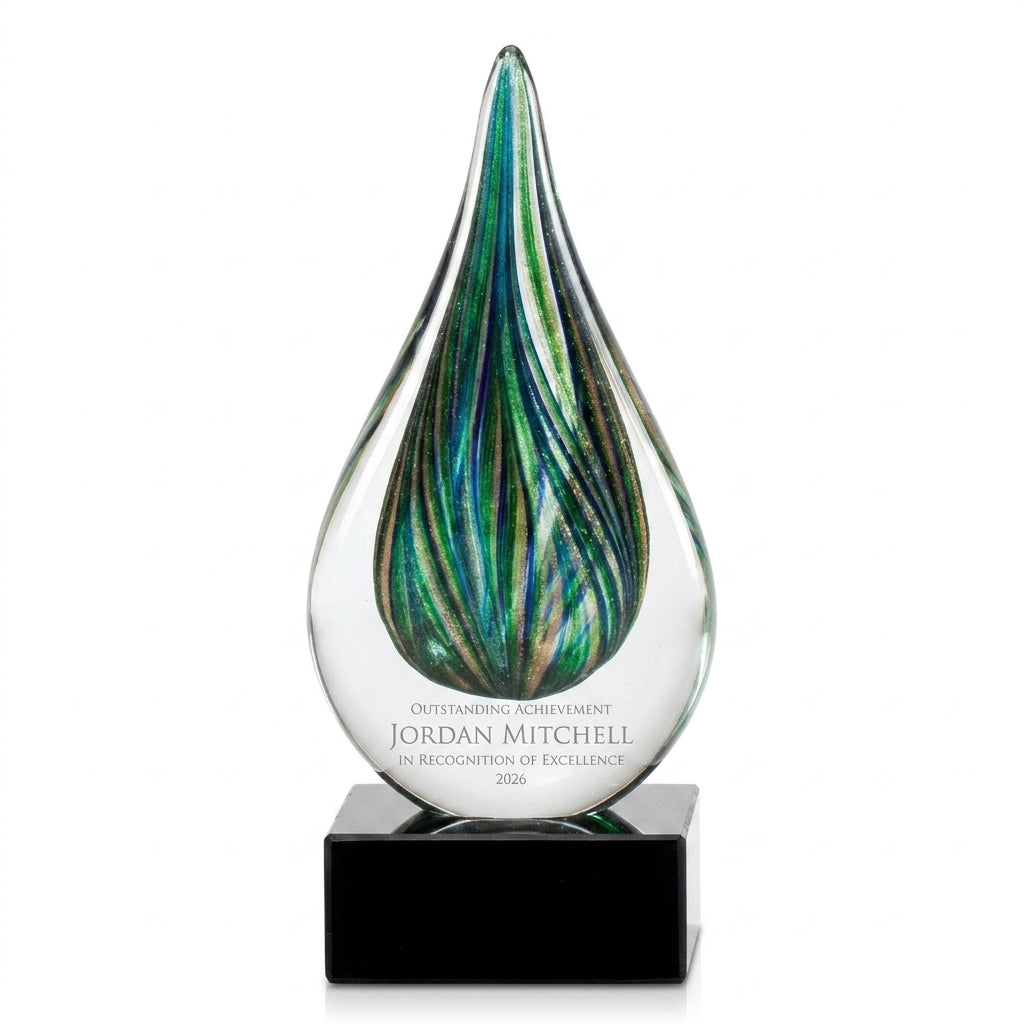 Personalized Emerald Gold Raindrop art glass award, custom laser engraved recognition award on a clean white studio background