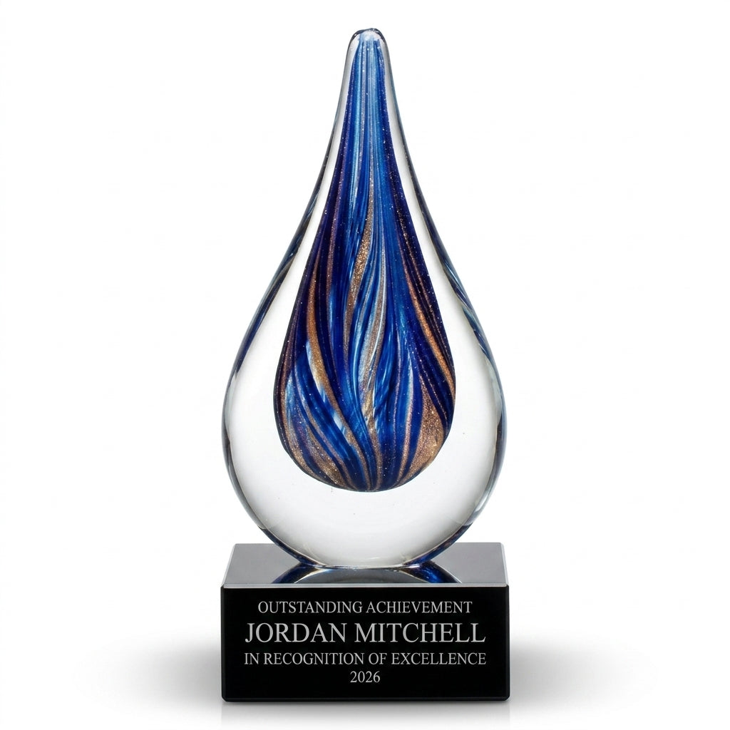 Personalized Sapphire Gold Raindrop art glass award, custom laser engraved recognition award on a clean white studio background