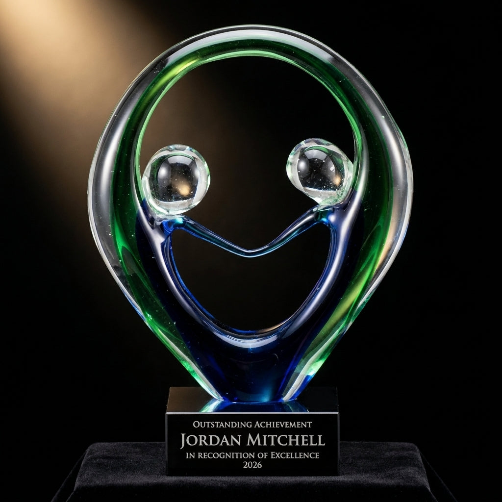 Personalized Sculpture art glass award on black velvet under awards-ceremony spotlight, engraved champion and lifetime achievement award