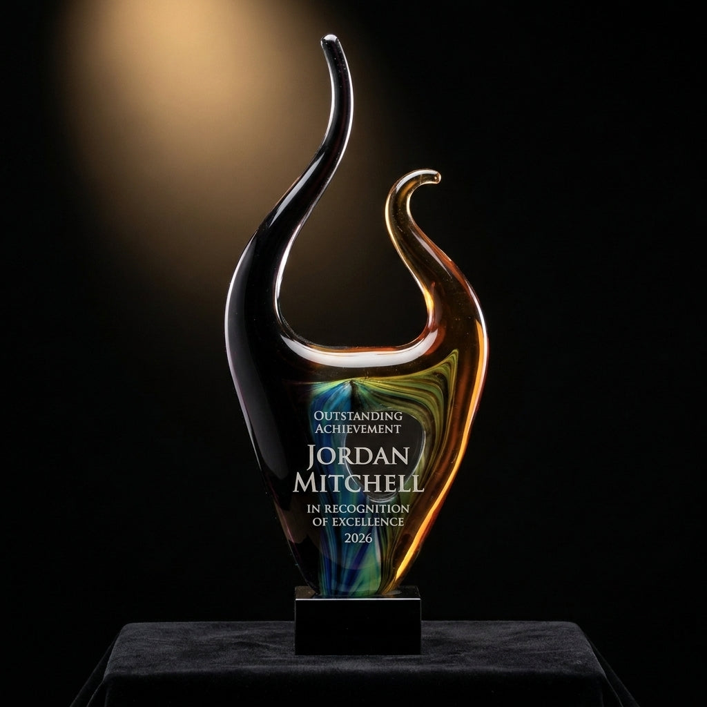 Personalized Sculpture art glass award on black velvet under awards-ceremony spotlight, engraved champion and lifetime achievement award