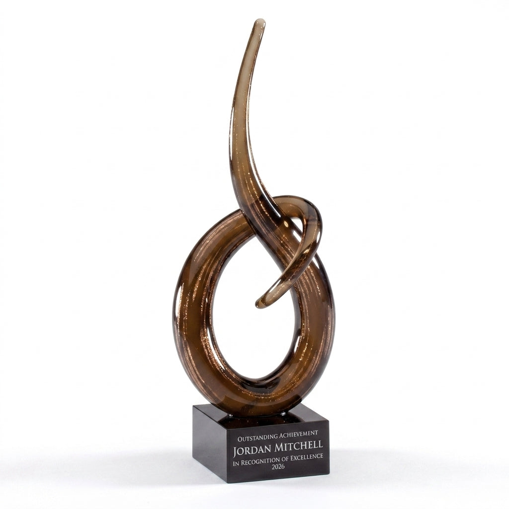Personalized Small art glass award, custom laser engraved recognition award on a clean white studio background